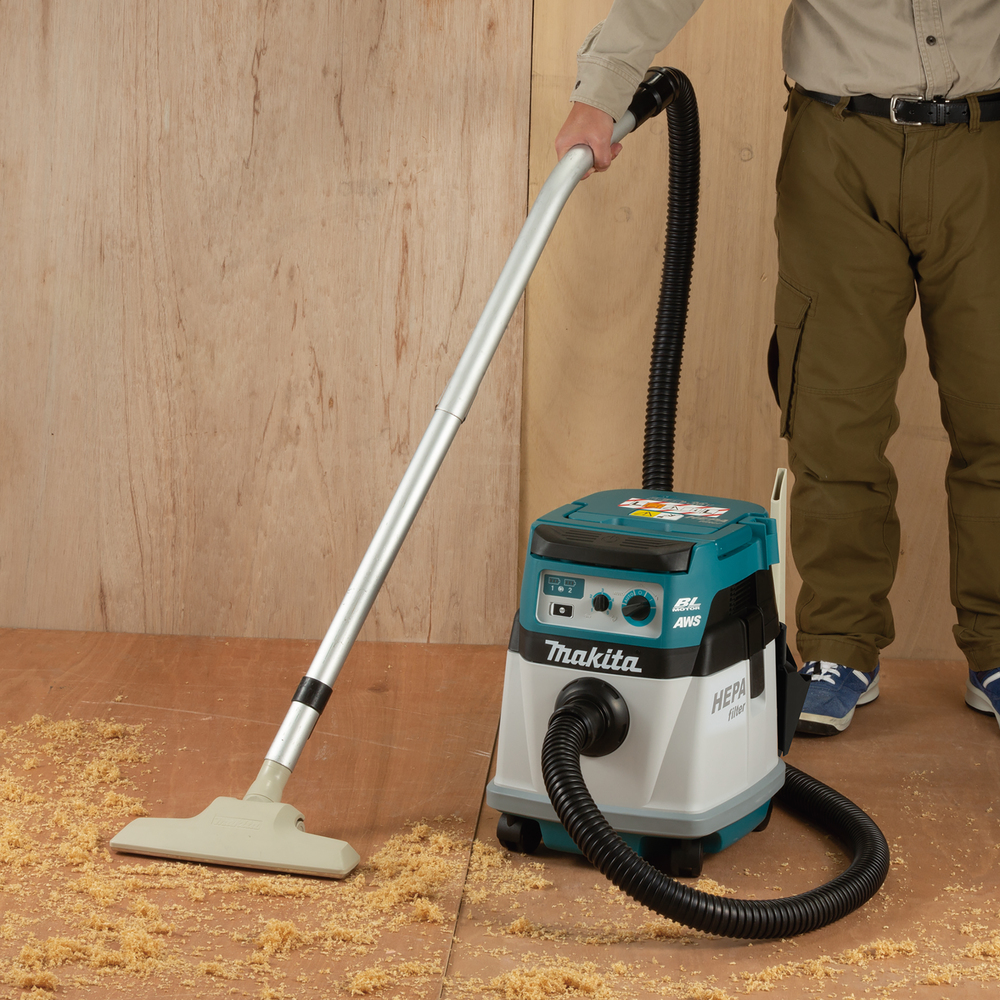 Пылесос аккумуляторный с Bluetooth-системой автоматического запуска Makita DVC157LZX3 2х18В, 15л, без акб и ЗУ