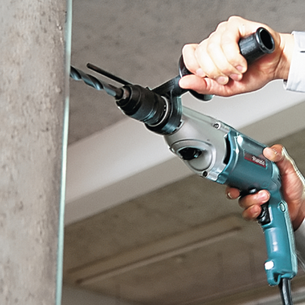 Дрель ударная электрическая Makita HP2051F 720 Вт, БЗП-13 мм, 0-1200\2900 об/мин