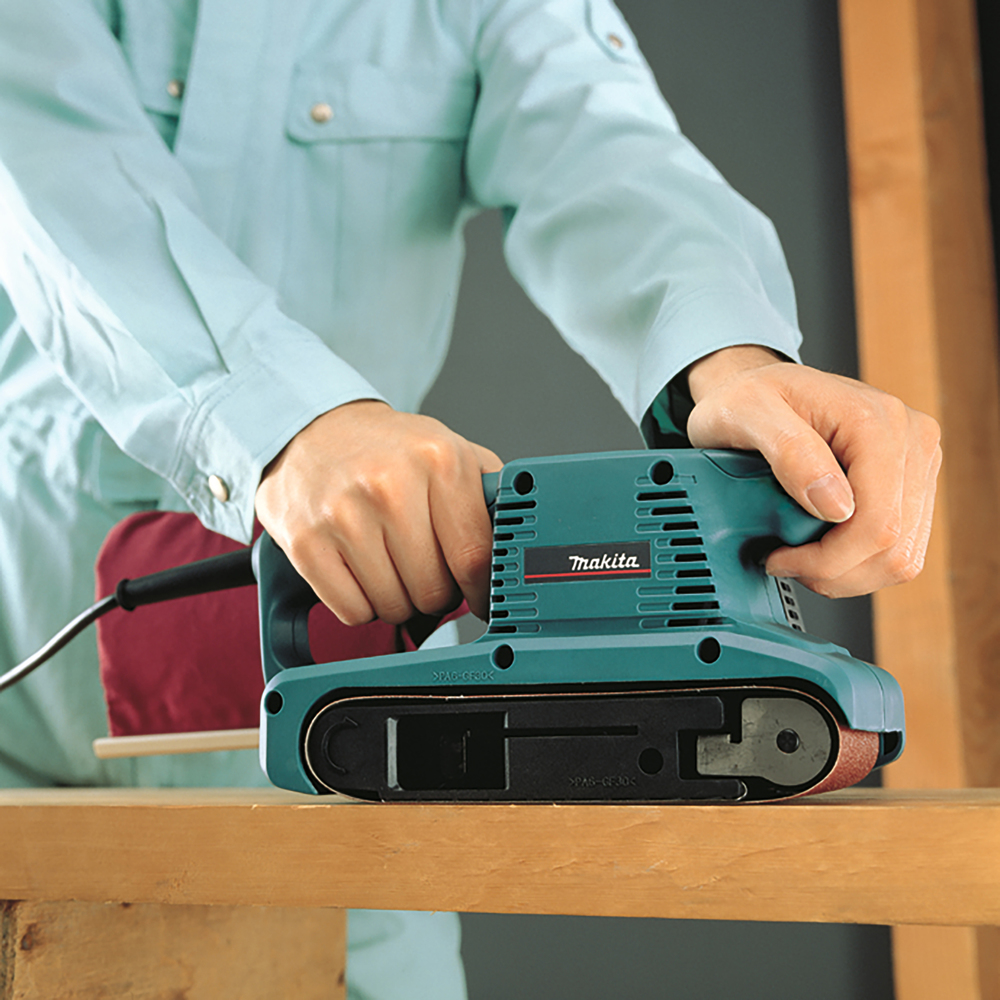 Ленточная шлифовальная машина электрическая  Makita 9910K 650 Вт, 76х457 мм, 270 м/мин